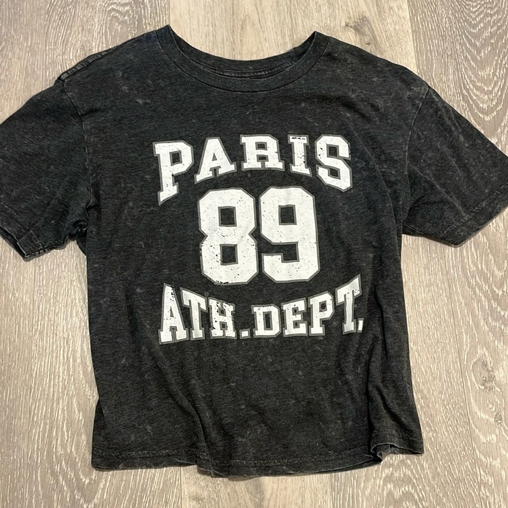 Dark gray T-shirt.